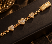 Load image into Gallery viewer, 10k Yellow Gold Chino Semi Solid Bracelet with Three Heart Charms
