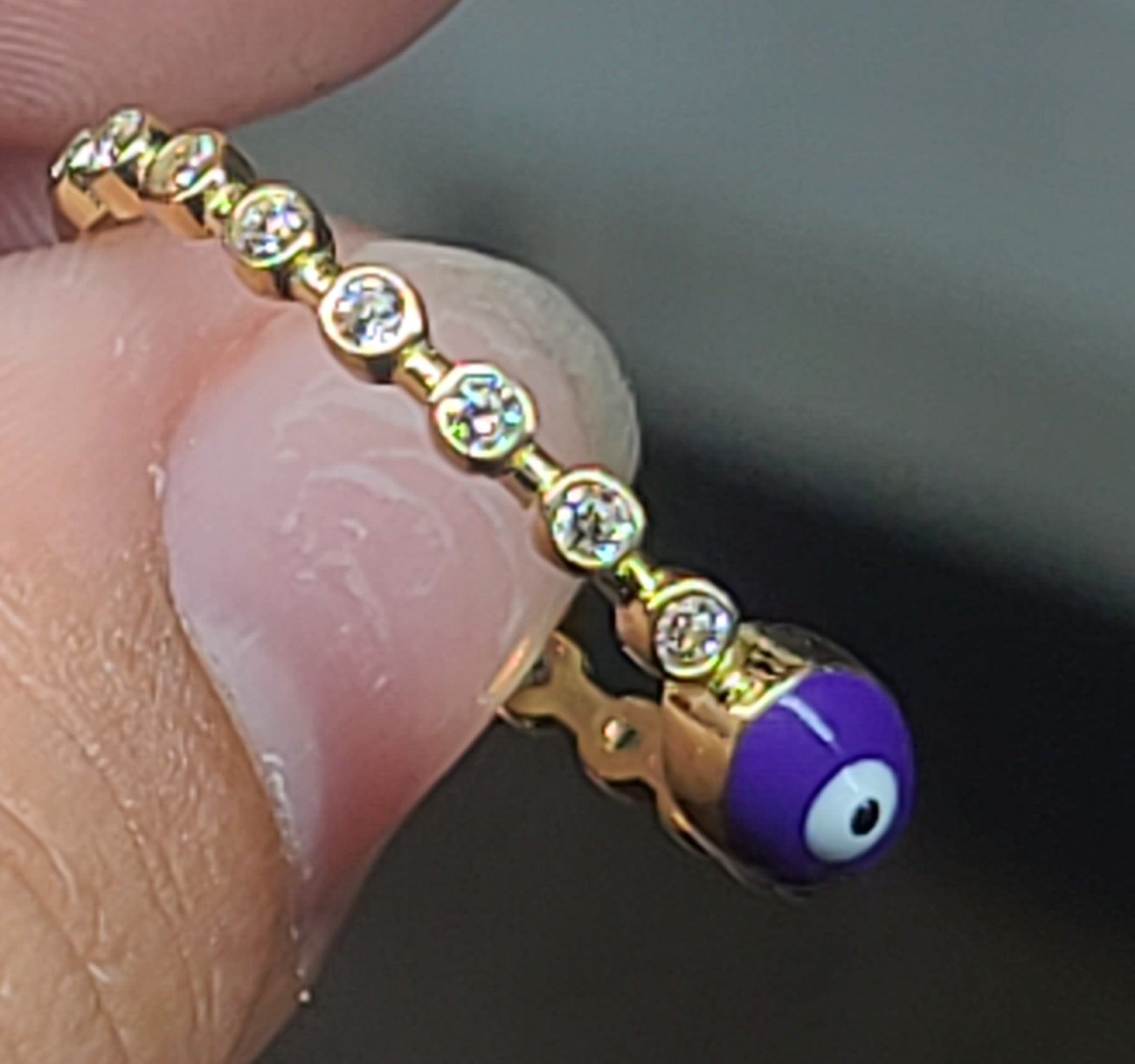 Yellow Gold Circular Ring With Purple Ojito