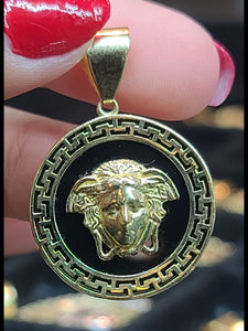 Small Yellow Gold Circular Pendant with Medusa and Reflective Background