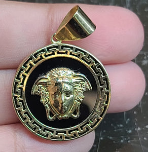 Small Yellow Gold Circular Pendant with Medusa and Reflective Background